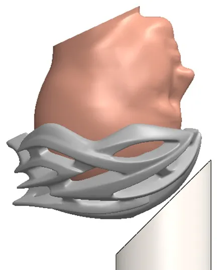 CAD view of the EN 17950 headform and helmet positioned on the 45° anvil for the front impact.